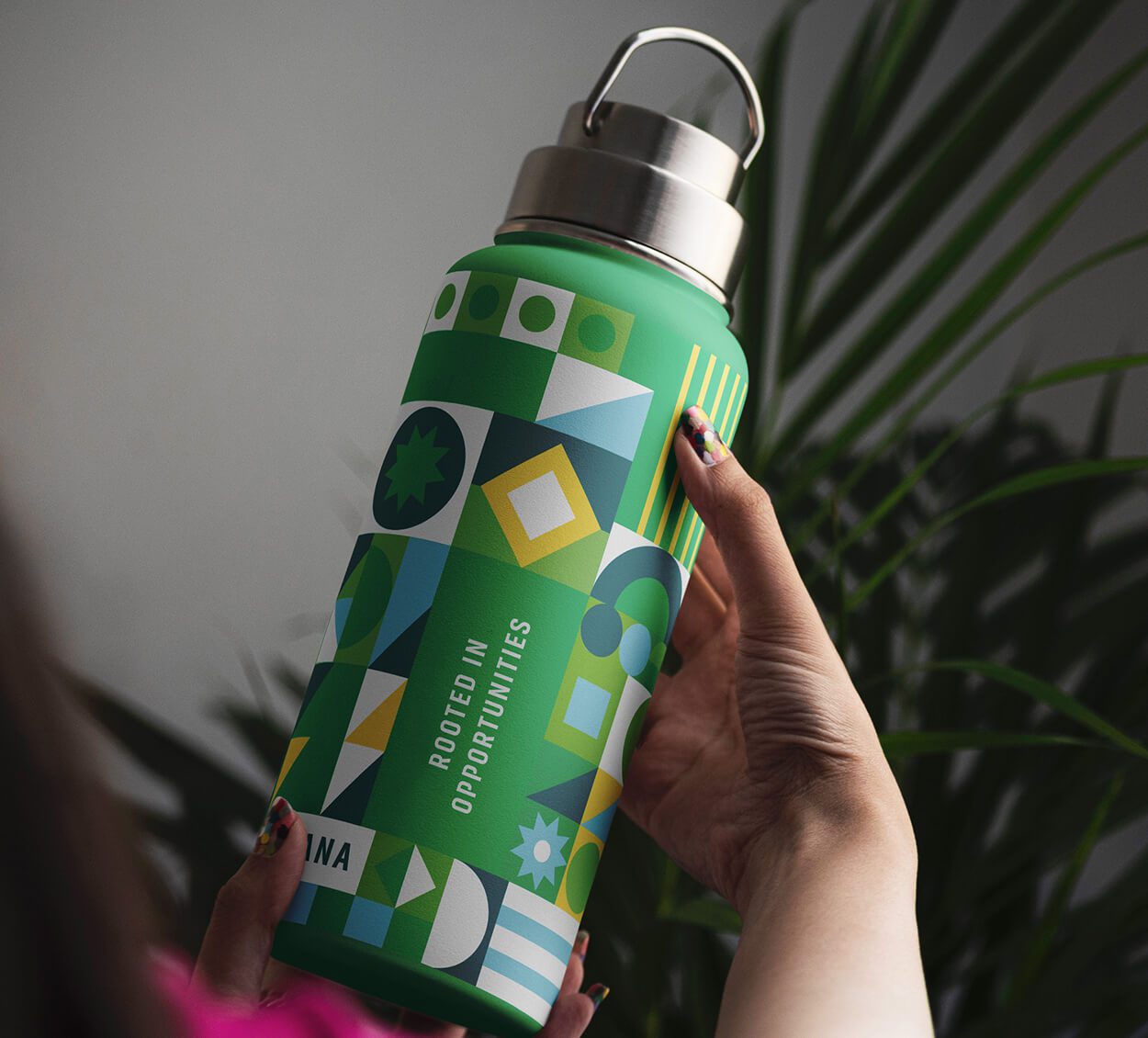 Water bottle with patterns and tagline on it