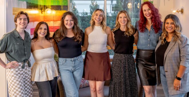 The seven team members of Rhyme & Reason standing together