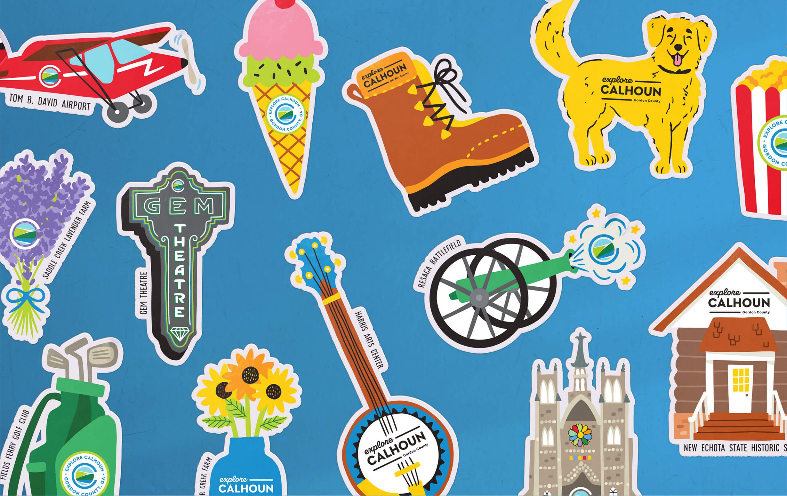 Flat lay of stickers showcasing Calhoun's attractions